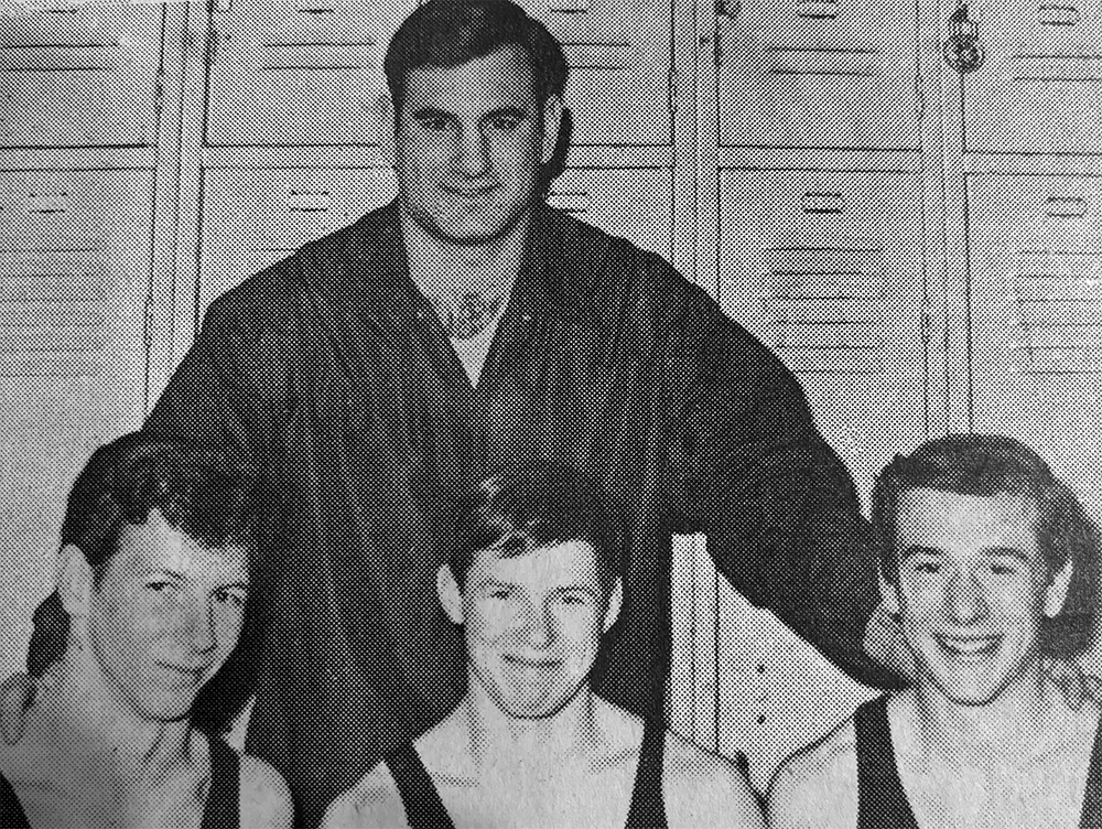 Denny Tave Coach with 3 team members